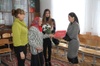 Spendenübergabe an Maria Nesterenko durch Elena Ushakova (rechts).